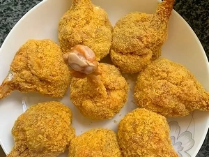 Empanizado de piernas de pollo